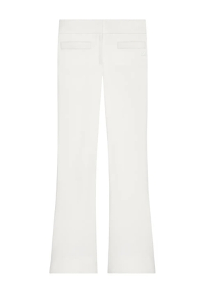 Courrèges logo-detail bootcut trousers - White