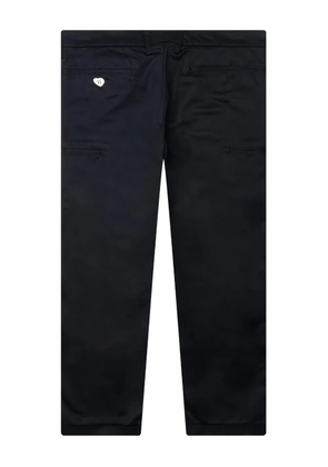 Human Made heart-embroidered chinos - Blue