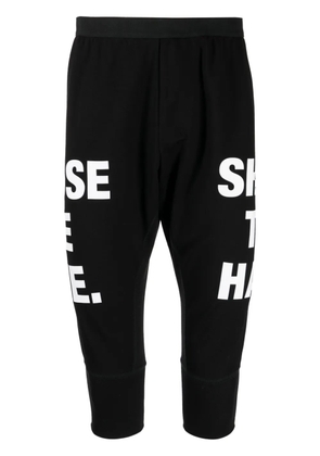 NILøS slogan-print drop-crotch shorts - Black