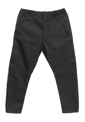 Prada Pre-Owned 2010s logo plaque trousers - Black