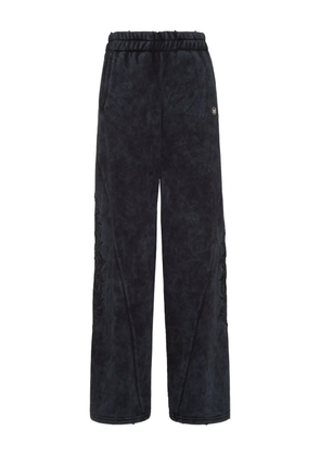 Philipp Plein embroidered panelled track pants - Black