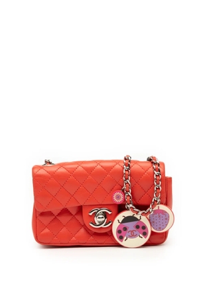 CHANEL Pre-Owned 2003-2004 Extra Mini Quilted Lambskin Ladybug Flap crossbody bag - Red