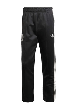 adidas three-stripe embroidered track pants - Black