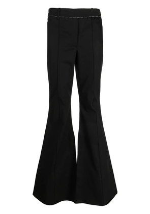 Nackiyé Mick flared cotton trousers - Black