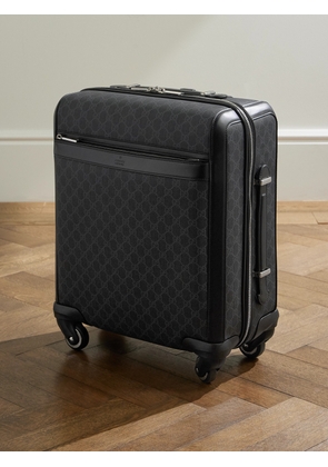Gucci - Leather-Trimmed Monogrammed Coated-Canvas Suitcase - Men - Black
