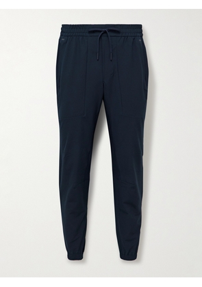 Lululemon - License to Train Slim-Fit Tapered Stretch Recycled-Shell Track Pants - Men - Blue - S
