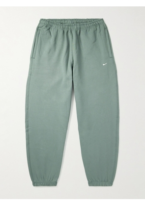 Nike - Solo Swoosh Tapered Logo-Embroidered Cotton-Blend Jersey Sweatpants - Men - Green - S