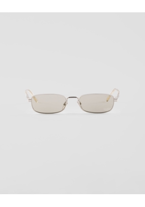 Sunglasses with the iconic metal plaque