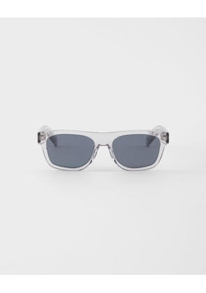 Sunglasses with the iconic metal plaque