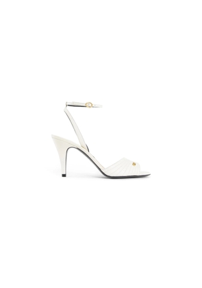 VALENTINO WOMAN OFF-WHITE SANDALS & SLIDES