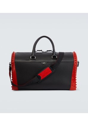 Christian Louboutin Sneakender spiked leather duffel bag
