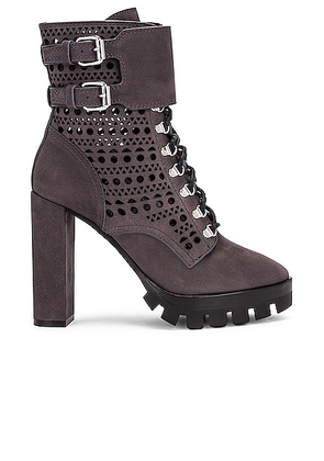 ALAÏA Perforated Military Boots in Cendre - Grey. Size 35.5 (also in 36, 36.5, 38.5).