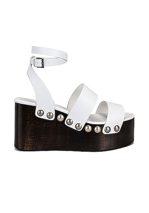 ALAÏA Ankle Strap Wedges in Blanc Casse - White. Size 35 (also in 36, 39, 40, 41).