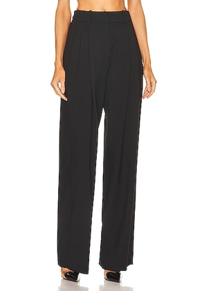 ALAÏA Fluid Pant in Noir - Black. Size 42 (also in ).