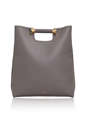 ALAÏA Bobine Folded Leather Tote - Moda Operandi