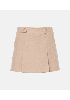 Tom Ford Wool and silk-blend boucle miniskirt