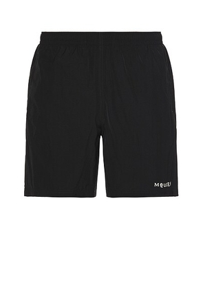 McQueen Swim Short in Black - Black. Size L (also in M, S).