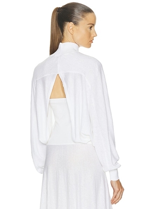 ALAÏA Batwing Jumper in Blanc - White. Size 34 (also in 38, 36, 40).