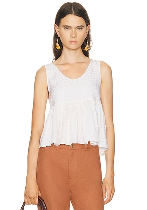 Chloe Peplum Tank Top in Iconic Milk - White. Size 34 (also in 36, 38, 40).