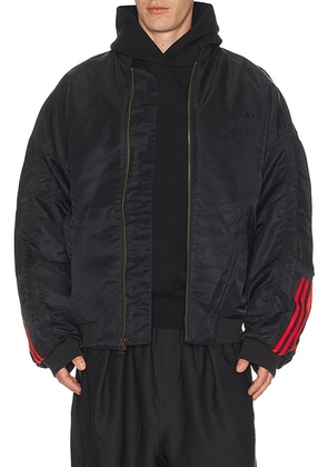 Adidas Originals x Willy Chavarria Satin Bomber Jacket in Black - Black. Size L (also in S, M, XL/1X).