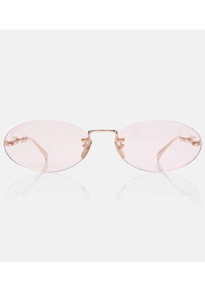 Gucci Logo embellished oval sunglasses