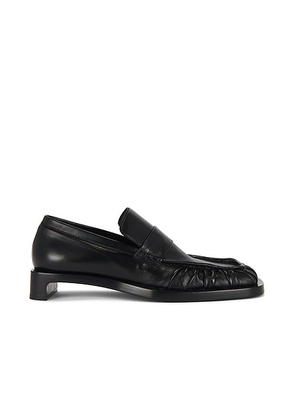 Jil Sander Heeled Loafer in Black - Black. Size 36 (also in 39.5, 41).