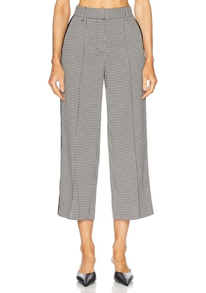 SIMKHAI Miki Cropped Button Hem Pant in Black White Check - Black,White. Size 4 (also in ).