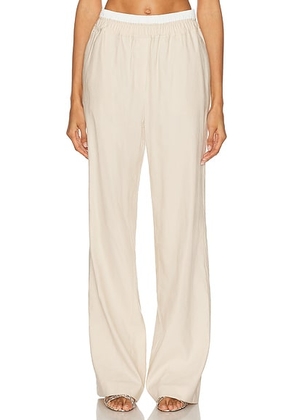 SIMKHAI Bristol Straight Leg Pant in Sand - Beige. Size M (also in ).