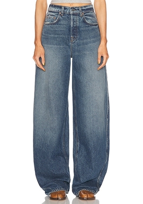 GRLFRND Paola Barrel Leg Long Inseam Jeans in Austin - Blue. Size 24 (also in ).