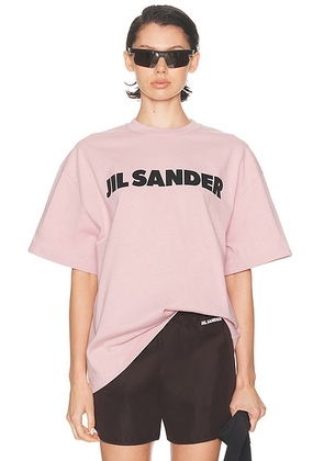 Jil Sander Crew Neck Short Sleeve T-Shirt in Neon Rose - Pink. Size L (also in XS, S).