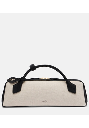 Alaia Le Teckel canvas clutch