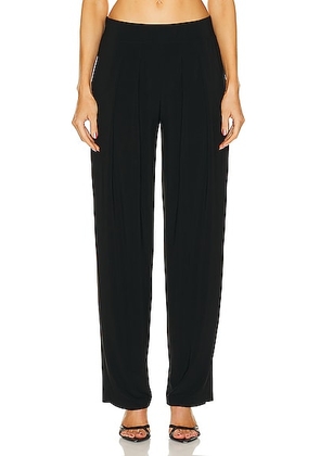 Norma Kamali Low Rise Pleated Trouser in Black - Black. Size XL (also in ).