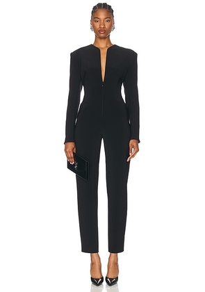 Norma Kamali Long Sleeve Shoulder Pad V Neck Zip Front Tapered Leg Jumpsuit in Black - Black. Size XS (also in ).