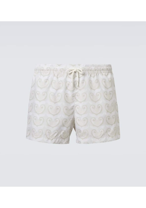 Commas Printed swim trunks