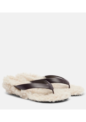 Le Monde Beryl Shearling-trimmed leather thong sandals