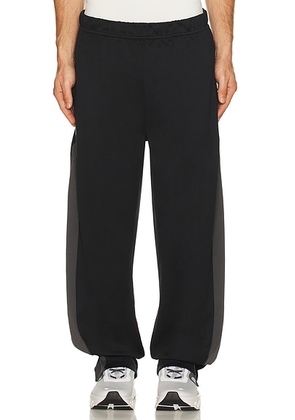 On x Ikon Track Pants in Black & Eclipse - Black. Size L (also in M, S).