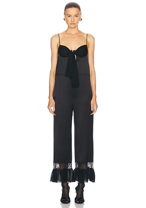Saint Laurent Flare Leg Jumpsuit in Noir - Black. Size 36 (also in 40, 42).