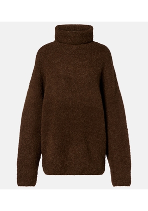 Toteme Alpaca and wool-blend boucle turtleneck sweater