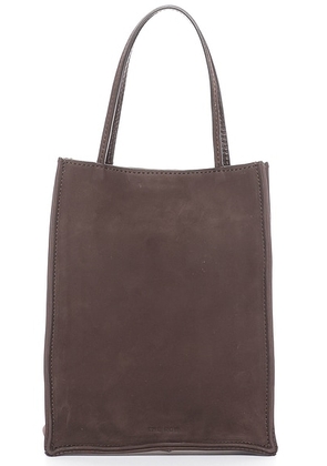 The Row Small To Go Tote Bag in Dark Aniline ANS - Brown. Size all.