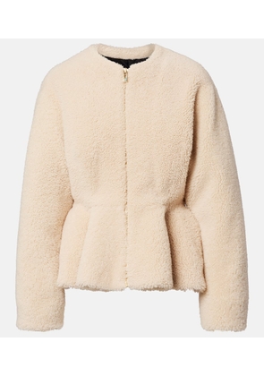 Alaia Peplum shearling jacket