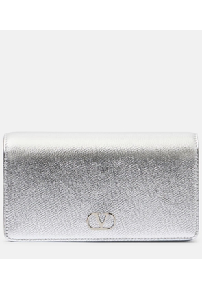 Valentino Garavani VLogo Mini metallic leather clutch