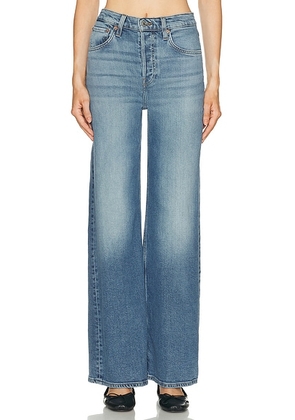 RE/DONE High Rise Wide Leg Jeans in Mid 70's Shadow - Blue. Size 24 (also in 25, 26, 27, 28, 29, 30, 31, 32).