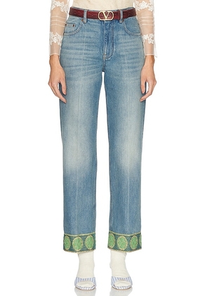 Valentino Straight Leg Jeans in Medium Blue - Blue. Size 25 (also in 28).