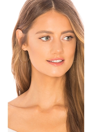 EF COLLECTION The Perfect Gold Hoop Earring in Metallic Gold.