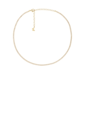 By Adina Eden Thin Tennis Choker in Metallic Gold.