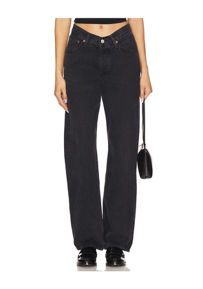 AGOLDE V-waist Kelly Jeans in Black. Size 23. Also in 30, 31.