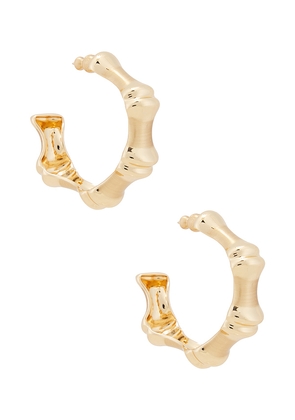 Cult Gaia Bambu Hoop Earrings in Metallic Bronze.