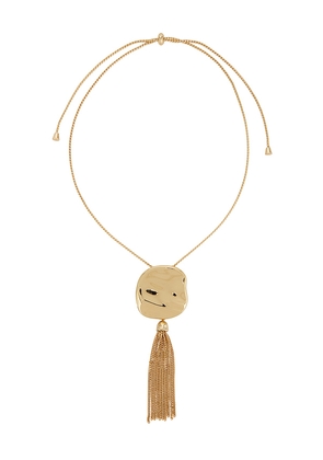 Ettika Molten Metal Tassel Necklace in Metallic Gold.