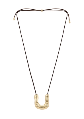 Ettika Liquid Luxe Cascade Curve Necklace in Metallic Gold.