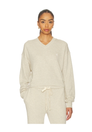 Eterne Cropped V-neck Sweatshirt in Beige. Size L. Also in M, S, XS.